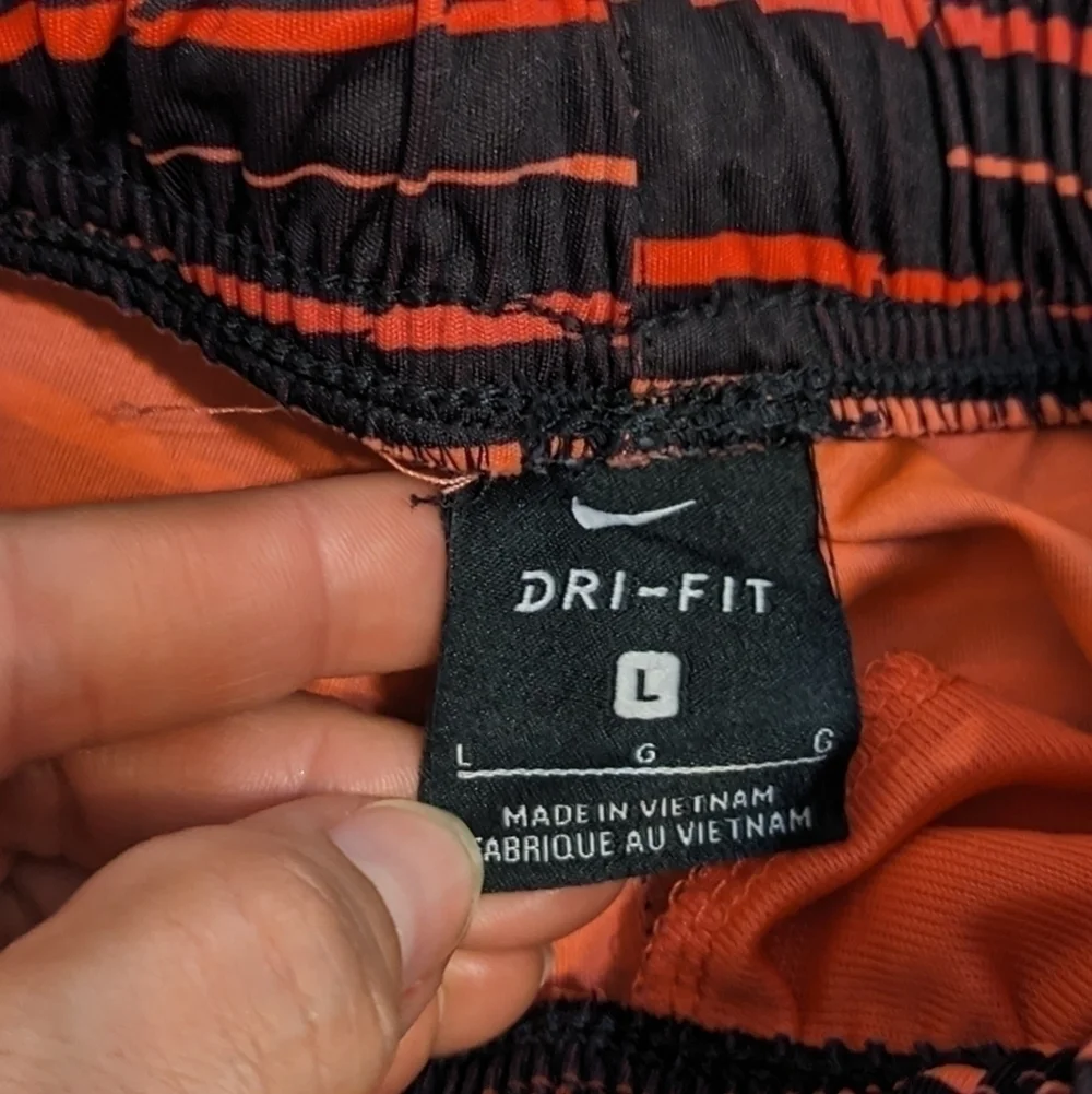 Nike Dri-Fit striped athletic shorts with an elastic waist size Large